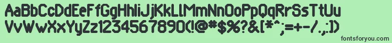 Pomcute Font – Black Fonts on Green Background