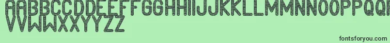 Edournida Font – Black Fonts on Green Background