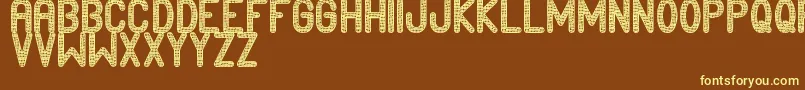 Edournida Font – Yellow Fonts on Brown Background