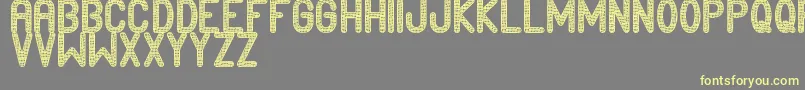 Edournida Font – Yellow Fonts on Gray Background