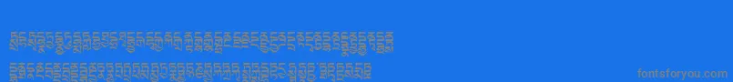 Tibetanmachineweb4-Schriftart – Graue Schriften auf blauem Hintergrund