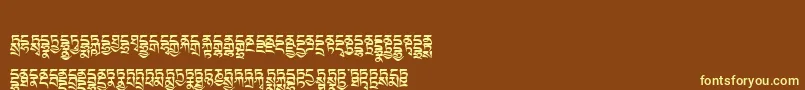 Tibetanmachineweb4 Font – Yellow Fonts on Brown Background