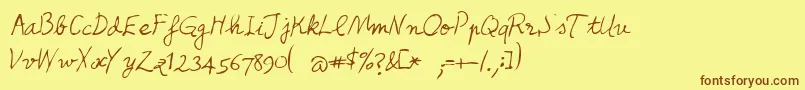 フォントHoncho – 茶色の文字が黄色の背景にあります。