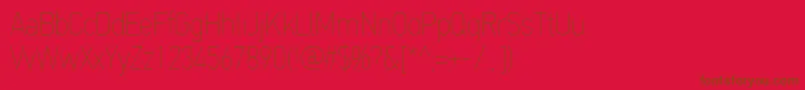 PfdintextcondproXthin Font – Brown Fonts on Red Background