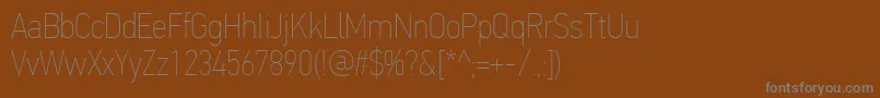 フォントPfdintextcondproXthin – 茶色の背景に灰色の文字
