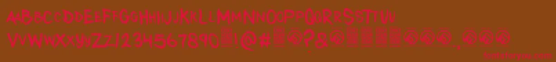 フォントAnytakersRegular – 赤い文字が茶色の背景にあります。
