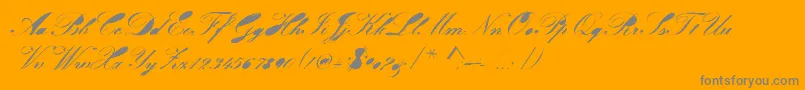 Velvet-Schriftart – Graue Schriften auf orangefarbenem Hintergrund