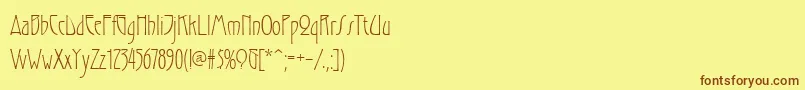 フォントGradl – 茶色の文字が黄色の背景にあります。
