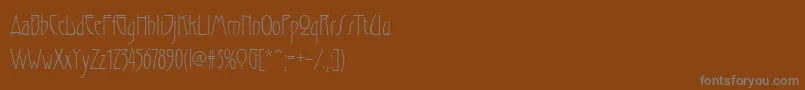 フォントGradl – 茶色の背景に灰色の文字