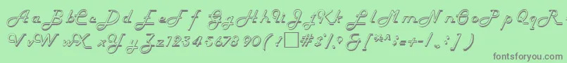 HelenaRegular-fontti – harmaat kirjasimet vihreällä taustalla