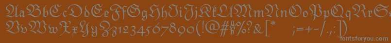 Шрифт Monarchiatext – серые шрифты на коричневом фоне