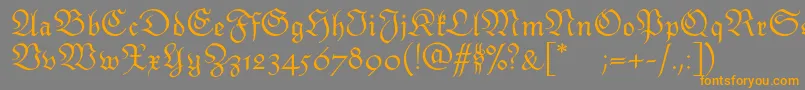 Monarchiatext Font – Orange Fonts on Gray Background