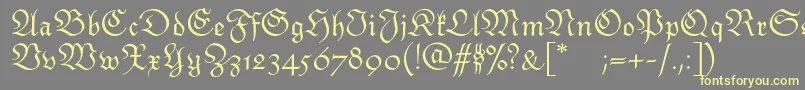 Шрифт Monarchiatext – жёлтые шрифты на сером фоне