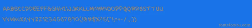 フォントKangaroocourtleft – 青い背景に灰色の文字