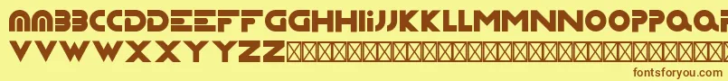 フォントCapsture – 茶色の文字が黄色の背景にあります。