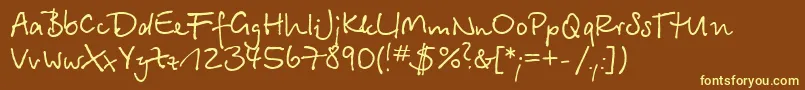 BetinascriptcRegular Font – Yellow Fonts on Brown Background