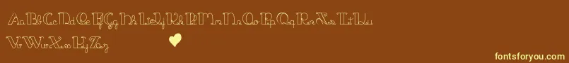 JackAndTheBeanstalk-fontti – keltaiset fontit ruskealla taustalla