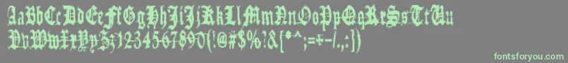 MetamorphoseRequiem-Schriftart – Grüne Schriften auf grauem Hintergrund
