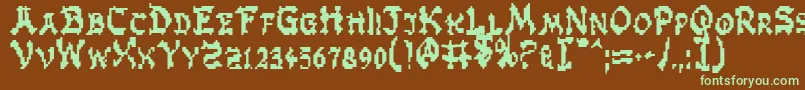 フォントZenMasters – 緑色の文字が茶色の背景にあります。
