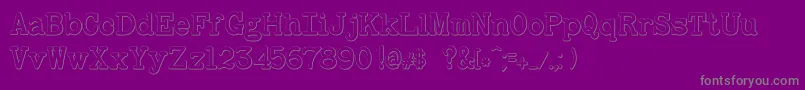 BaltimoretypewriterboldBeveled-Schriftart – Graue Schriften auf violettem Hintergrund