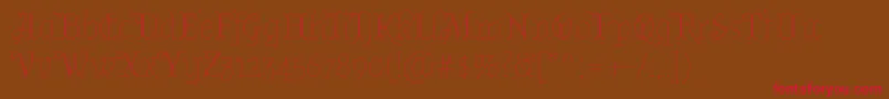 AlmendradisplayRegular Font – Red Fonts on Brown Background