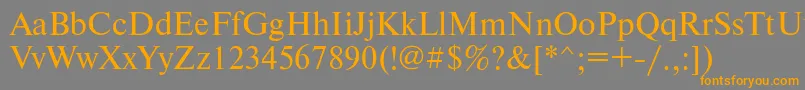 フォントNewtondosctt – オレンジの文字は灰色の背景にあります。