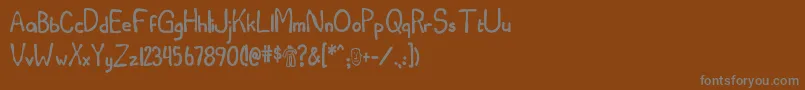 フォントJimteach – 茶色の背景に灰色の文字