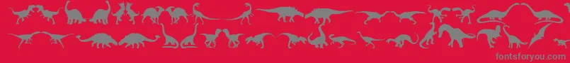 Fonte Dingosaurs11 – fontes cinzas em um fundo vermelho