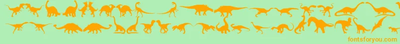 Czcionka Dingosaurs11 – pomarańczowe czcionki na zielonym tle