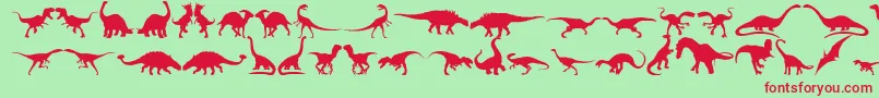 Dingosaurs11-Schriftart – Rote Schriften auf grünem Hintergrund