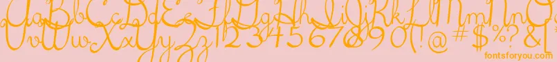 5thgradecursive2-Schriftart – Orangefarbene Schriften auf rosa Hintergrund