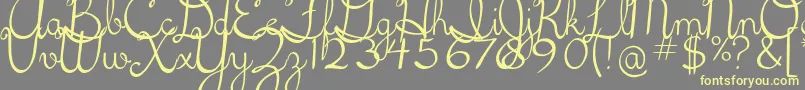 5thgradecursive2 Font – Yellow Fonts on Gray Background