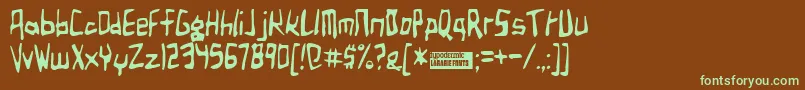 フォントBirdland – 緑色の文字が茶色の背景にあります。