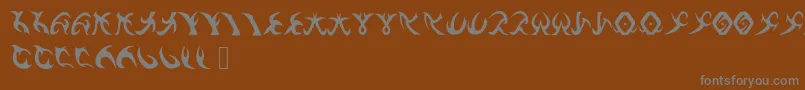 フォントDrennSRunes – 茶色の背景に灰色の文字