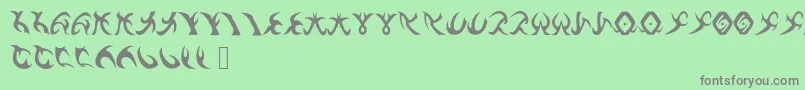 Fonte DrennSRunes – fontes cinzas em um fundo verde