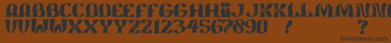JmhFeliz Font – Black Fonts on Brown Background