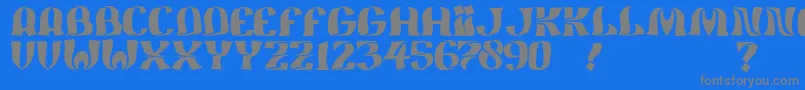 フォントJmhFeliz – 青い背景に灰色の文字