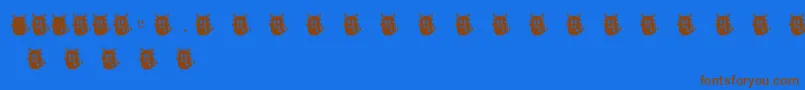 BmdLoveMonsterMonster-Schriftart – Braune Schriften auf blauem Hintergrund