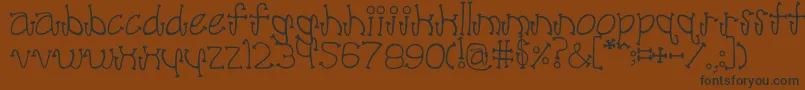 PoodleLover Font – Black Fonts on Brown Background