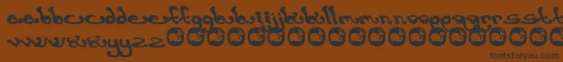 Saiba mais sobre a fonte Earthling Fonte Earthling – fontes pretas em um fundo marrom