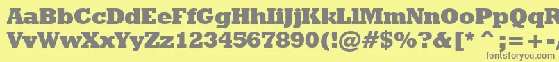 Fonte GeometricSlabserif712ExtraBoldBt – fontes cinzas em um fundo amarelo