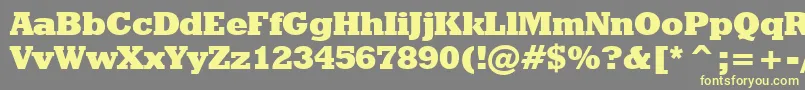 Czcionka GeometricSlabserif712ExtraBoldBt – żółte czcionki na szarym tle