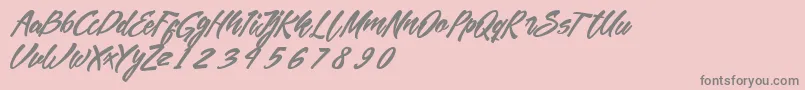 Fonte MekarScript – fontes cinzas em um fundo rosa