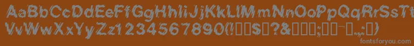 フォントEightcountssk – 茶色の背景に灰色の文字