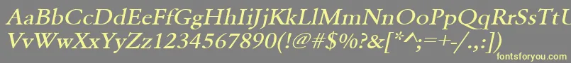 UrwgaramondtmedextwidOblique-Schriftart – Gelbe Schriften auf grauem Hintergrund