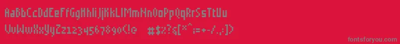 Grudblit-fontti – harmaat kirjasimet punaisella taustalla