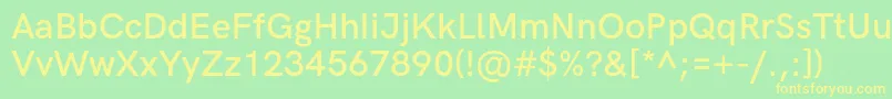HkgroteskSemibold-Schriftart – Gelbe Schriften auf grünem Hintergrund
