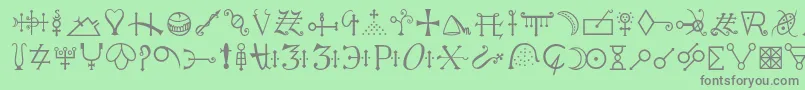 フォントAlchemyc – 緑の背景に灰色の文字