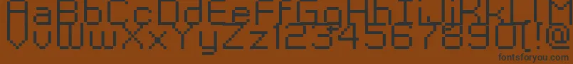 fuente Kyrou9RegularXtnd – Fuentes Negras Sobre Fondo Marrón