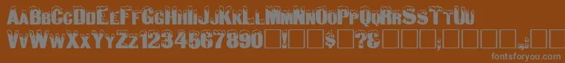 Igloo-fontti – harmaat kirjasimet ruskealla taustalla